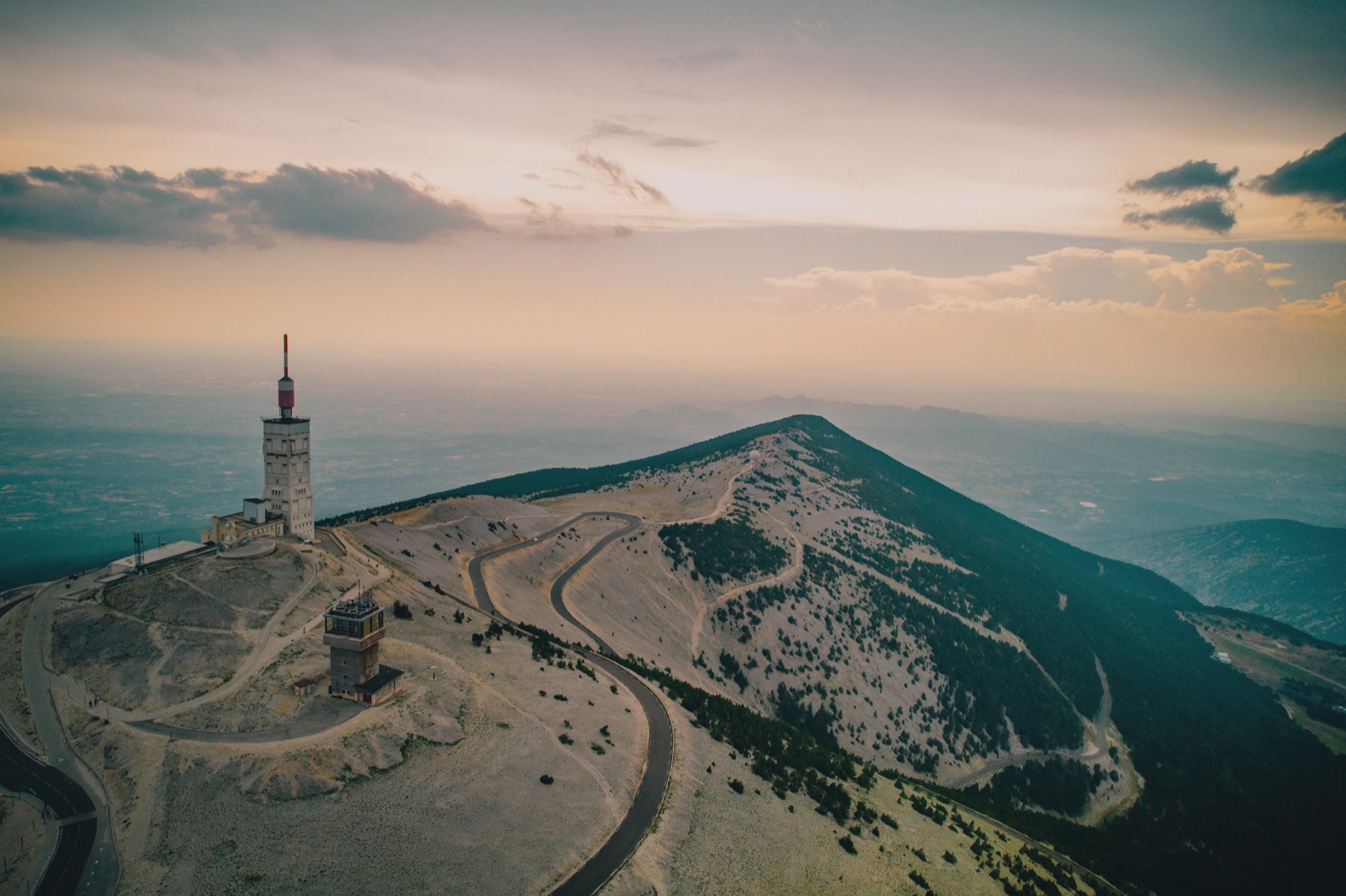Summit tower and bare slopes of Mont Ventoux from a drone