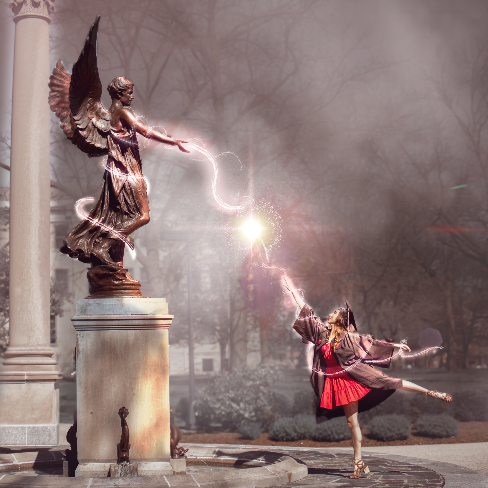 Composite of a dancer and a bronze angel statue joined by lightning