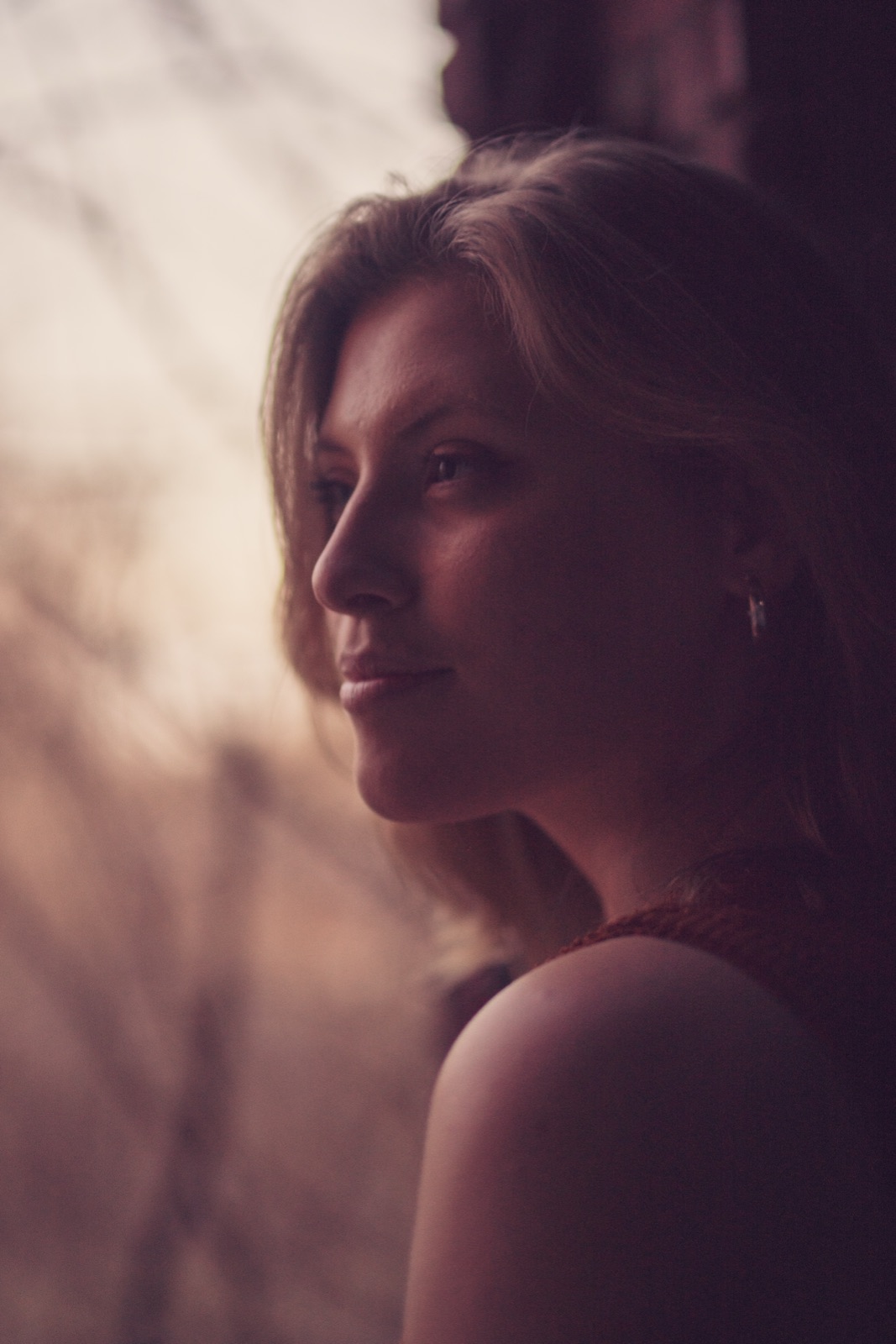Woman in profile in warm light